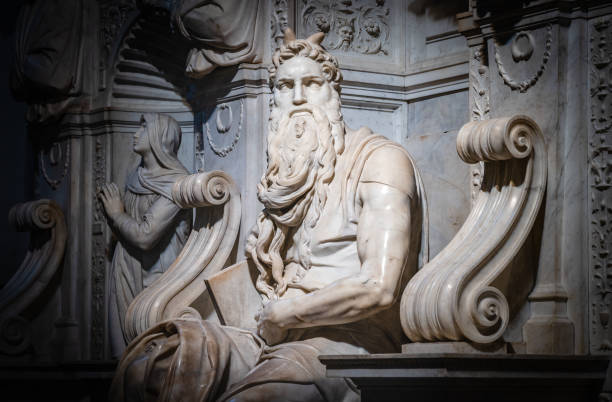 Moses, Renaissance sculpture by Michelangelo Buonarroti Rome, Italy - December 12, 2018: Moses, 1515 Italian High Renaissance Carrara marble sculpture by Michelangelo Buonarroti, housed in the church of San Pietro in Vincoli with vignetting effect. michelangelo artist stock pictures, royalty-free photos & images