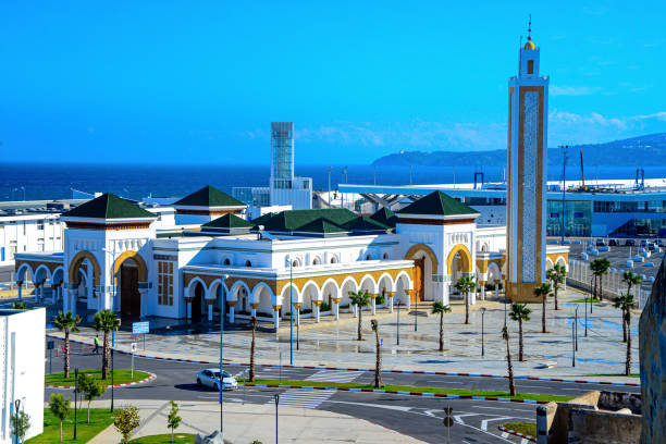 Mosque in the Moroccan city of Tangier. Moroccan mosque with the banner of Morocco. Islamic mosque for prayer. Port of Tangier casablanca morocco stock pictures, royalty-free photos & images