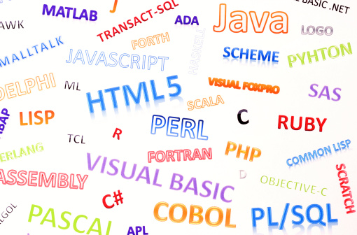 Milan, Italy - July 12, 2013: WordArt with the names of the most famous computer programming codes.Programming in a given programming language generally means writing one or more simple ASCII text file.