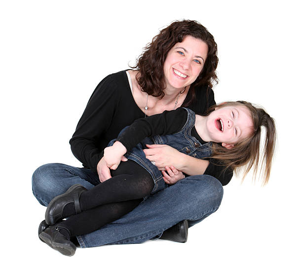 Mother and daughter Mother and daughter plating isolated on white tickling beautiful women pictures stock pictures, royalty-free photos & images