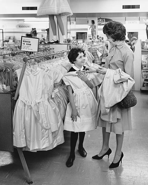 Mother and daughter shopping for clothes  department store photos stock pictures, royalty-free photos & images