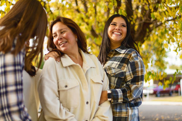 Mother and Daughters Vibrant and Beautiful Hispanic Females Autumn Outdoors in Western USA Afro-Latinx Lifestyle Photo Series Vibrant and Beautiful Hispanic Females Autumn Outdoors in Western USA Matching 4K Video Available (Shot with Canon 5DS 50.6mp photos professionally retouched - Lightroom / Photoshop - original size 5792 x 8688 downsampled as needed for clarity and select focus used for dramatic effect) eyecrave stock pictures, royalty-free photos & images