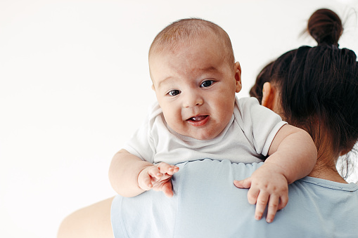 how to burp the baby after breastfeeding