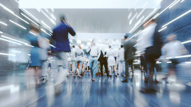 motion blur of modern commuters in the city - airport lounge imagens e fotografias de stock