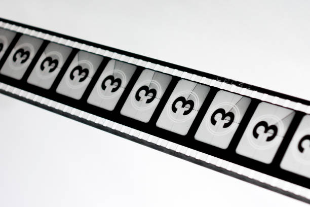 Motion picture film strip. Film countdown leader with the number three on it. stock photo