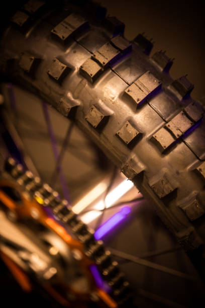 Motocross motorcycle enduro knobby tire Close up shot of a motocross motorcycle enduro knobby tire. knobby knees stock pictures, royalty-free photos & images