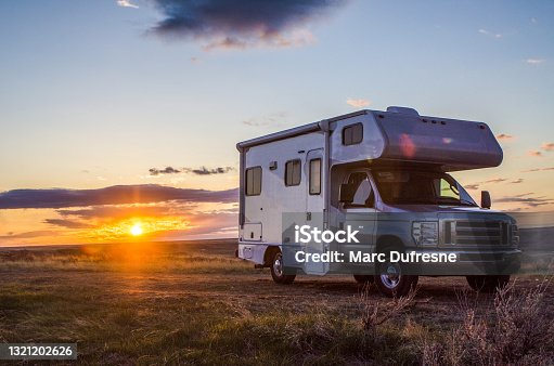 istock Motor home and sunset 1321202626