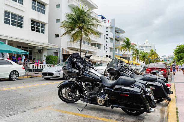 Motorcycles parked along ocean dr street south Miami beach stock photo