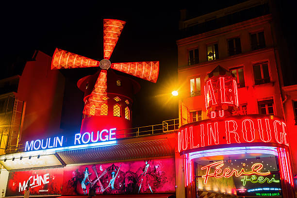 Moulin Rouge in Paris, France, at night stock photo