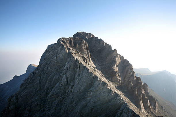 Mount Olympus "Summit of Mount Olympus from Mount Skala. Mount Olympus is highest mountain in Greece at 2917 meters. Peak name is Mytikas. Mount Olympus is the home of the Twelve Olympians, the principal gods in the Greek pantheon." mount olympus stock pictures, royalty-free photos & images