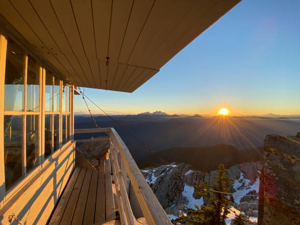 Mount Pilchuck fire lookout at sunrise Mount Pilchuck fire lookout at sunrise in Verlot, Washington, United States fire lookout tower stock pictures, royalty-free photos & images