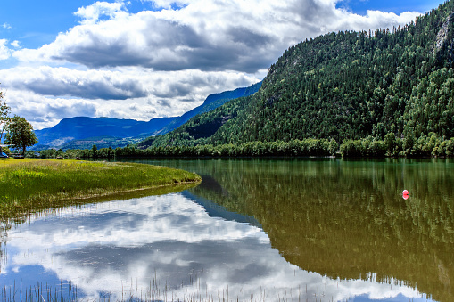media.istockphoto.com/photos/mountain-and-lake-mjo...