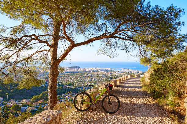 Mountain bike MTB Denia at Montgo track Spain Mountain bike MTB Denia at Montgo track in alicante Spain costa blanca stock pictures, royalty-free photos & images