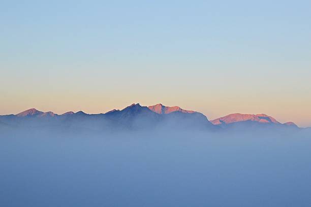 Mountain in the mist stock photo