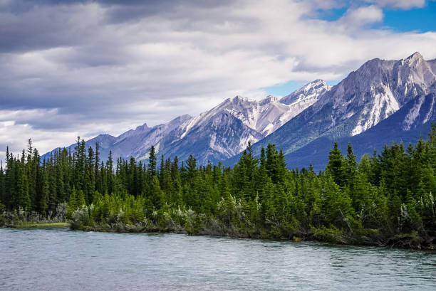 Mountain Ridge and Bow River in Canmore, Alberta, Canada stock photo