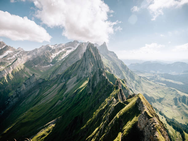 Mountain ridge in Appenzellerland canton Rocky face mountain and mountain peaks in Appenzell, Switzerland rock face stock pictures, royalty-free photos & images