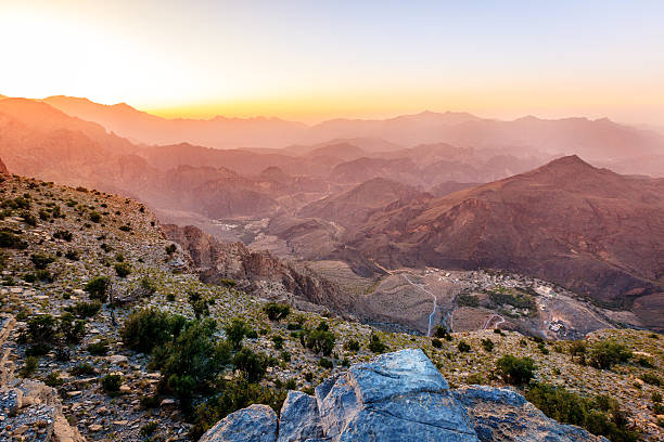 Mountains of Oman Scenic view of Al Hajar mountains in the Sultanate of Oman at sunset oman stock pictures, royalty-free photos & images