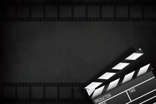 Movie clapper board with film strip on black background Movie clapper board with film strip on black background clapboard photos stock pictures, royalty-free photos & images