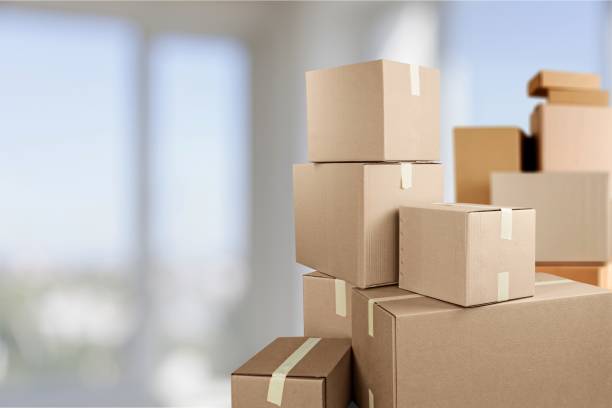 Moving. Cardboard boxes in room, move out concept relocation stock pictures, royalty-free photos & images