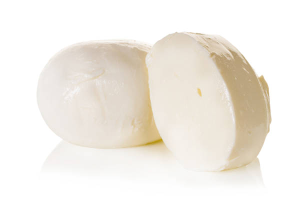mozzarella cheese on a white isolated background mozzarella cheese on a white isolated background with clipping path mozzarella stock pictures, royalty-free photos & images