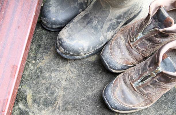 Muddy Boots At Door Stock Photos, Pictures & Royalty-Free Images - iStock