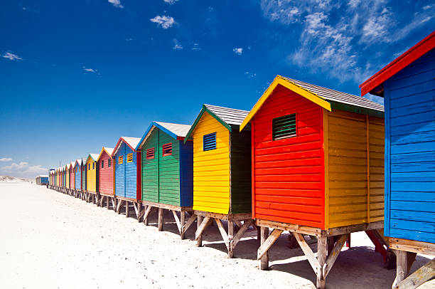 Muizenberg Beach Cape Town "Muizenberg colorful beach huts in Cape Town, South africa." beach hut stock pictures, royalty-free photos & images