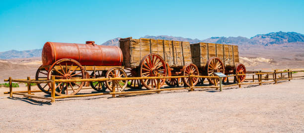 A 20 Mule Team Borax wagon train in historic Harmony Borax Works area in Death Valley National Park, California stock photo