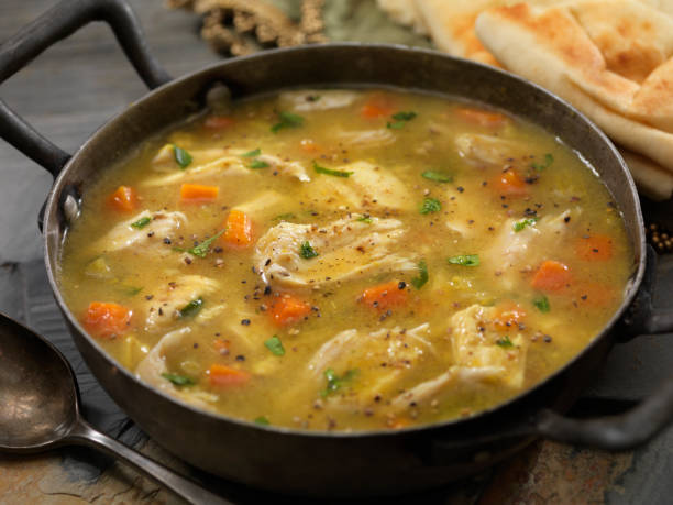 Mulligatawny Soup with Naan Mulligatawny Soup with Naan chicken soup stock pictures, royalty-free photos & images