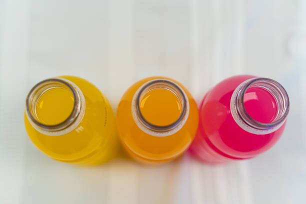 Multi colored Energy sport drink bottles with different flavours stock photo