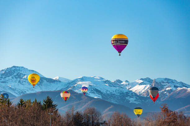 Multi colored hot air balloon at Mondovì, Piedmont, Italy. stock photo