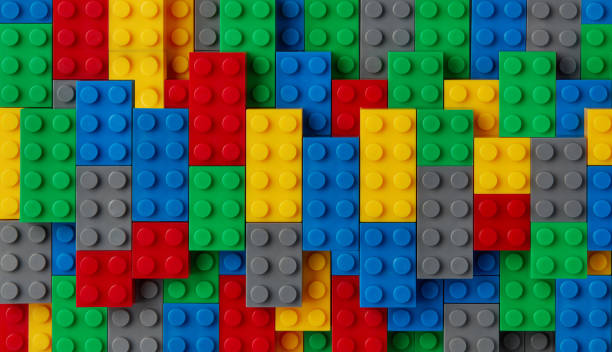 Multi-colored bricks background Plastic toy blocks on white background toy block stock pictures, royalty-free photos & images