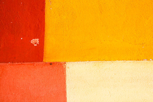 Multi-Colored Wall Texture "Mulit-colored wall texture of red, yellow, orange.View more backgrounds:" adobe backgrounds stock pictures, royalty-free photos & images