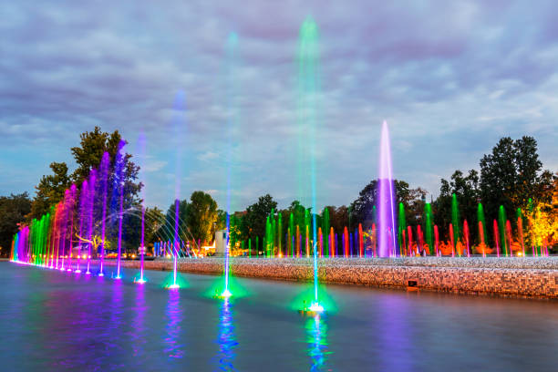 Multimedia fountain park during twilight, Warsaw, Poland - A colorful Fountain situated in the city center stock photo
