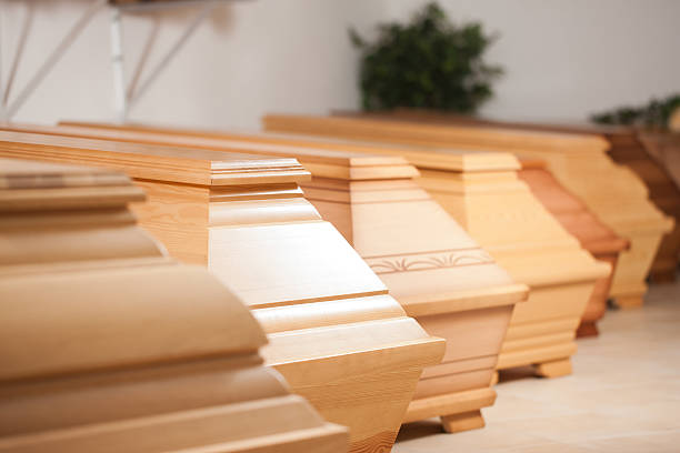 Multiple coffins for sale in a row stock photo