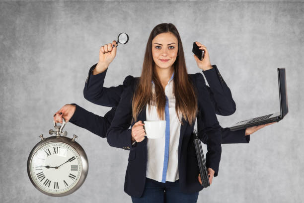 multi-purpose business woman with a large number of hands multi-purpose business woman with a large number of hands Time management stock pictures, royalty-free photos & images