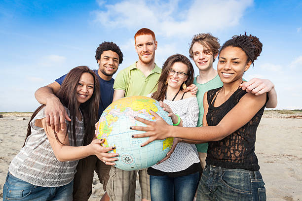 Multiracial Group of Friends with World Globe Map stock photo