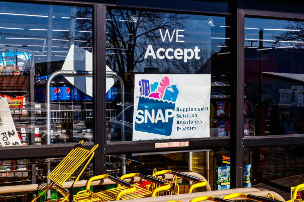 Muncie - Circa January 2018: A Sign at a Retailer - We Accept SNAP stock photo