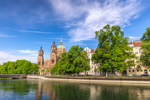 Munich city skyline at Saint Lukas Church and Isar River, Munich Germany Munich city skyline at Saint Lukas Church and Isar River, Munich Germany river isar stock pictures, royalty-free photos & images