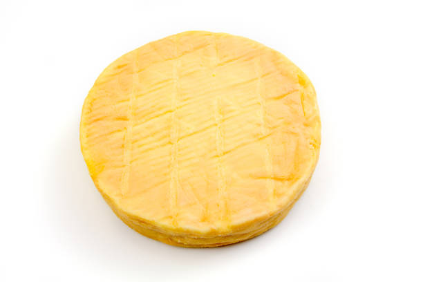 munster munster (French cheese) muenster cheese stock pictures, royalty-free photos & images