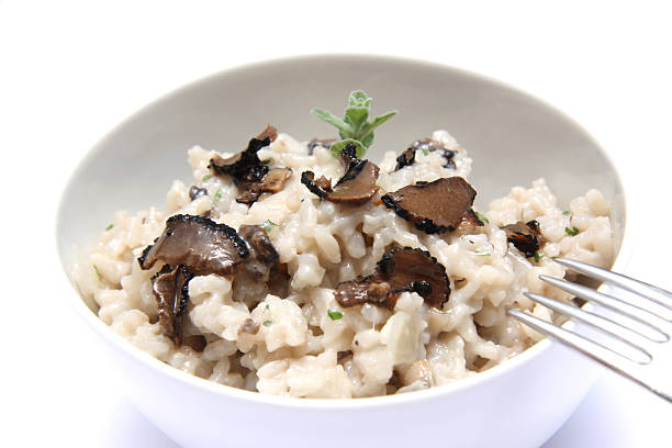 Mushrooms risotto with truffles stock photo