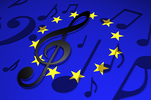 The flag of Europe (the EU) with musical symbols and notes over the top in 3D.