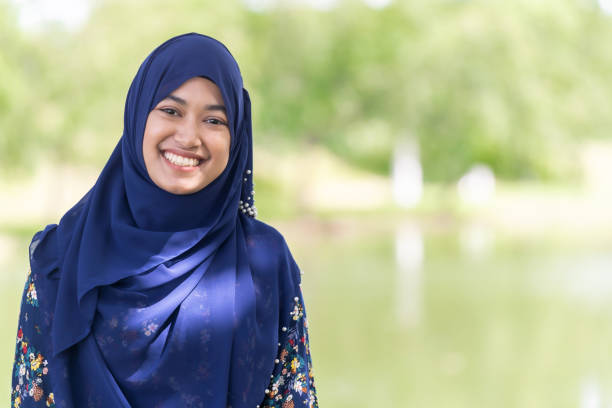 muslim girl portrait Portrait of good-looking Happy young teenager Muslim islamic asian university girl indonesian woman stock pictures, royalty-free photos & images