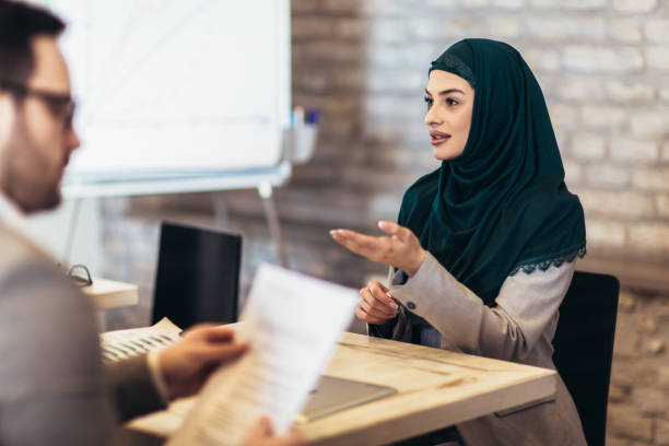 Muslim woman, job applicant having interview stock photo