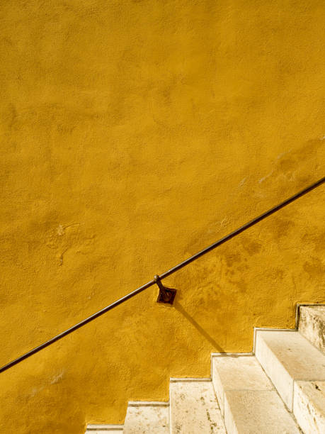 Mustard coloured Stair Wall stock photo