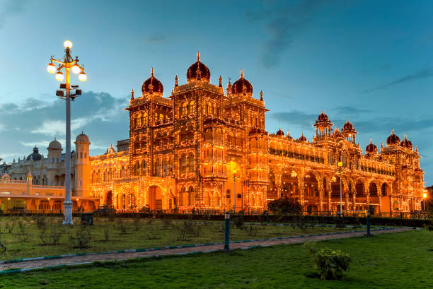 Mysore Palace, India The majestic Mysore Palace known also as Ambavilas Palace against the blue hour in Mysuru, Karnataka, South India. mysore stock pictures, royalty-free photos & images