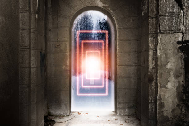 Mystical portal behind the gates of the old castle. Fantastic paranormal activity. stock photo
