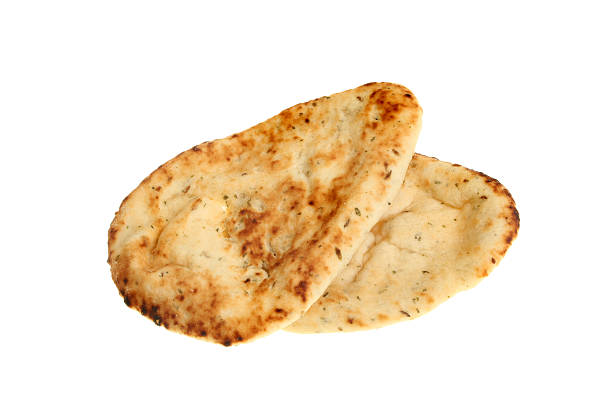 Naan breads Two naan breads isolated against white naan bread stock pictures, royalty-free photos & images