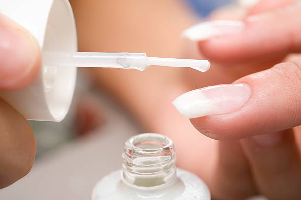 Nail polish liquid  artificial nail stock pictures, royalty-free photos & images