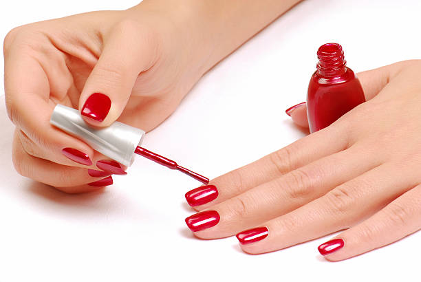 Nail salon.  painting fingernails stock pictures, royalty-free photos & images