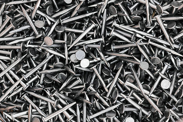 Nails. Background Background of silver construction carpenter's nails macro nail work tool stock pictures, royalty-free photos & images